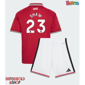 Manchester United Luke Shaw #23 Hjemmebanesæt Børn 2026-27 Kort ærmer (+ korte bukser)
